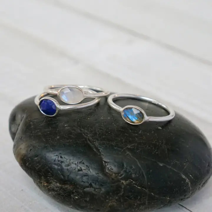 Simple sterling silver band with faceted Lapis stone